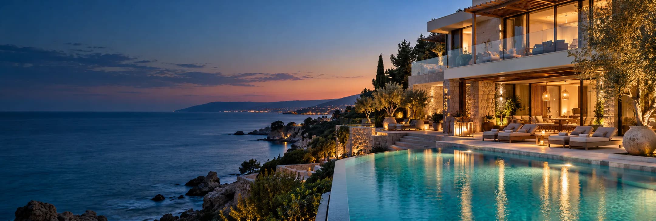 A boutique seaside hotel at dusk